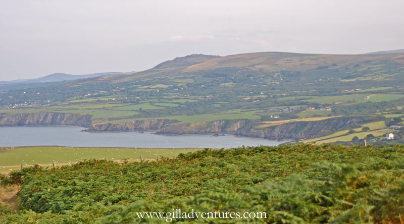 The view back to main shoreline to the east of Dinas Island, from the head.. 