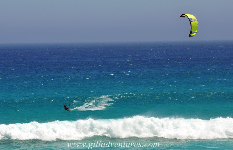 Good-Hope-kite-board A kite boarder enjoying the wind off the peninsula close to the Cape of Good Hope