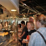 Our family designing our own ramen flavor at the instant ramen museum, osaka, japan. Photo taken on our trip around the world with our tween and teen children. 